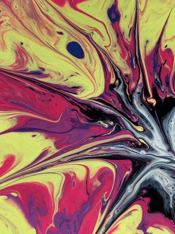 Colorful abstract painting with vibrant acrylic swirls creating a dynamic pattern.